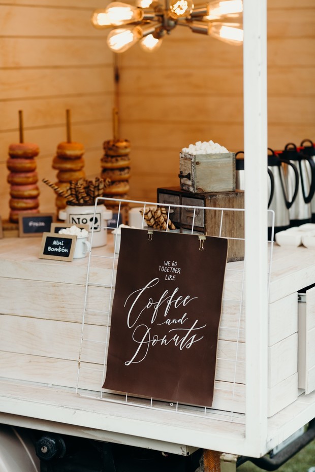 Rustic wedding coffee and donut bar with stylish sign