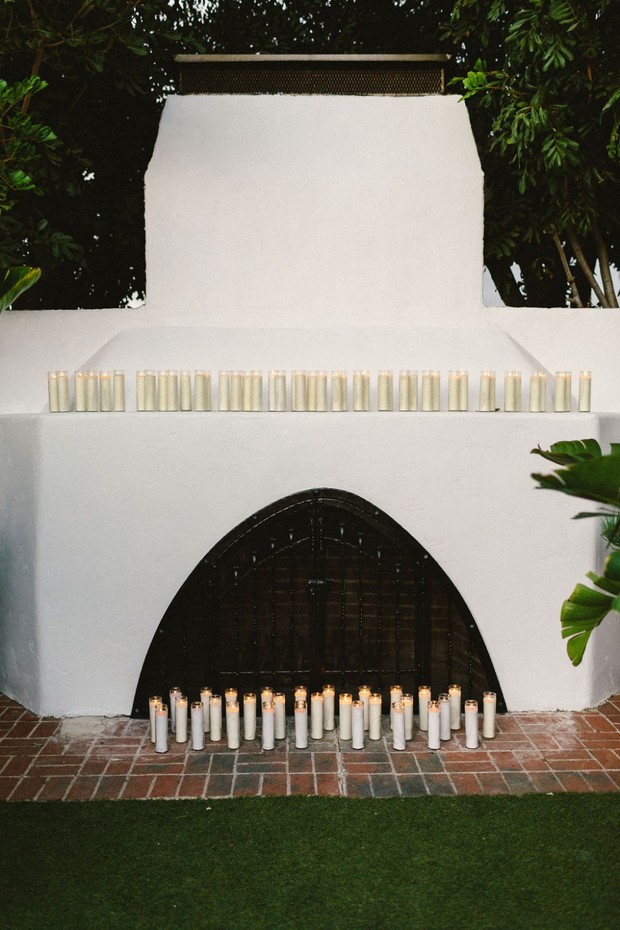 candle lit fireplace ceremony backdrop
