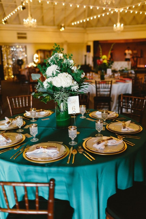 emerald green and gold wedding table decor