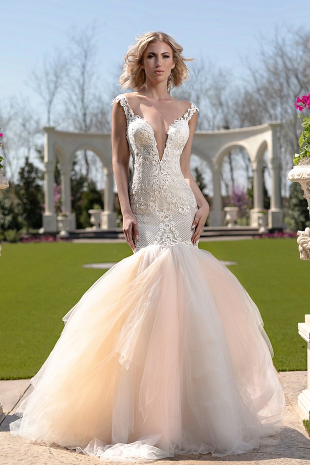 Bride in a stunning lace mermaid style wedding dress