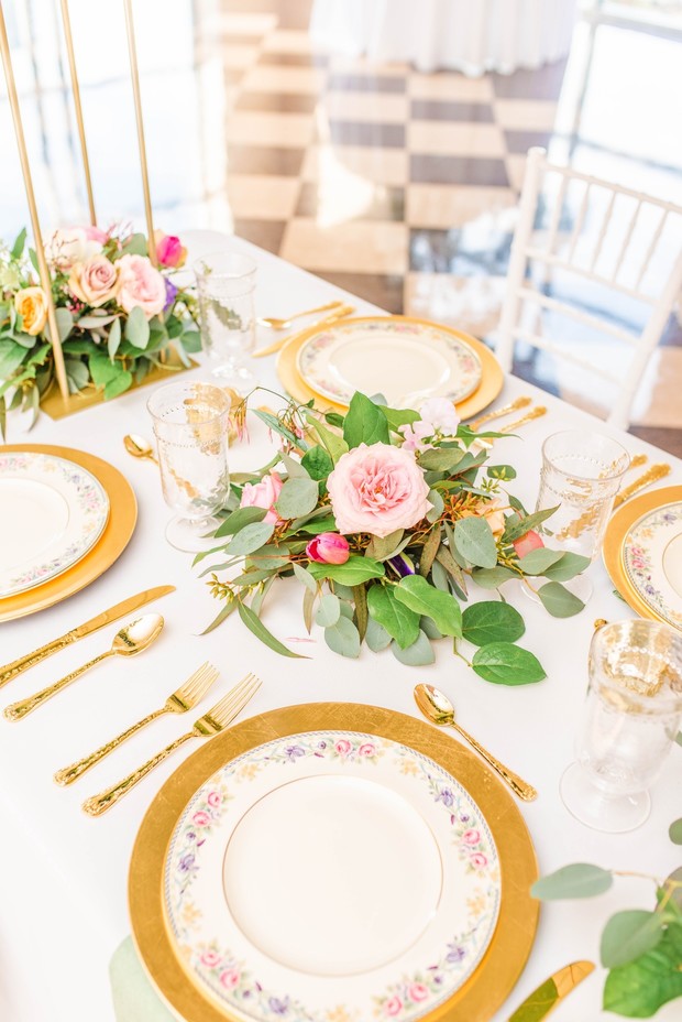 gold and floral print china place settings