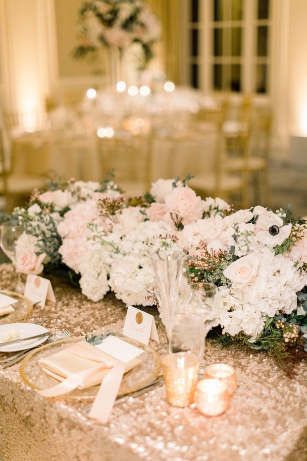 glittery blush and gold wedding sweetheart table