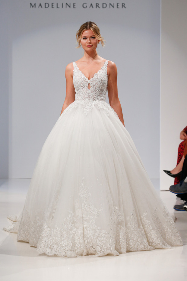 Stunning Madeline Gardner lace wedding gown runway model