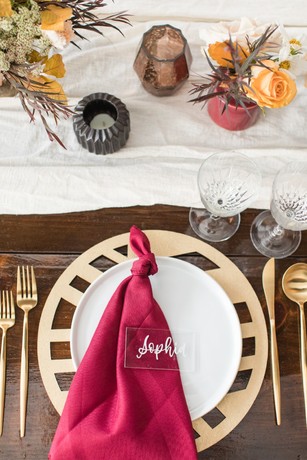 modern gold and burgandy wedding place setting