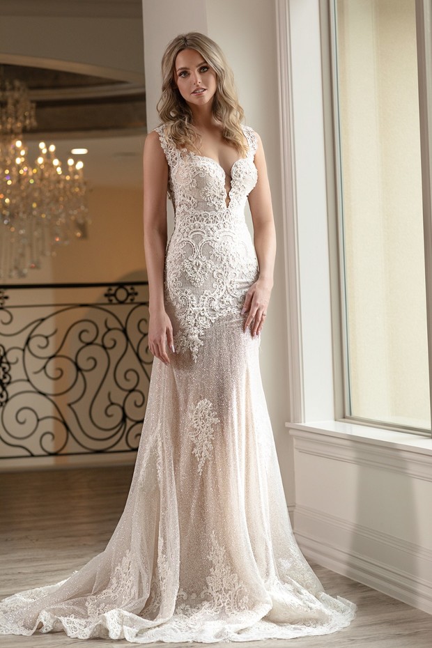 Woman in elegant lace mermaid wedding dress
