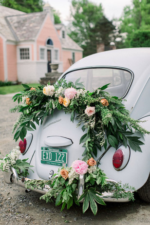 cute flower accented wedding car