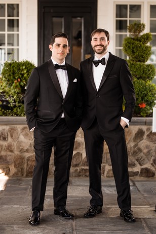 groom and groomsmen in tuxedos