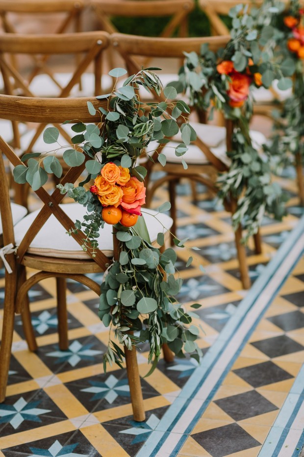 eucalyptus orange and rose wedding aisle decor