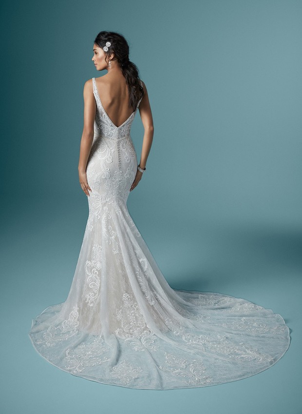 Stunning lace mermaid wedding dress with long train