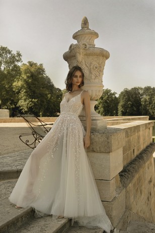 Elegant bride in embroidered tulle wedding gown