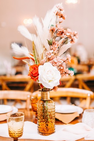 amber glass vase floral centerpiece