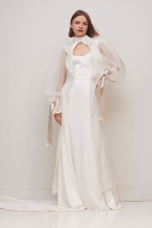 Elegant white high-neck wedding gown with sheer sleeves