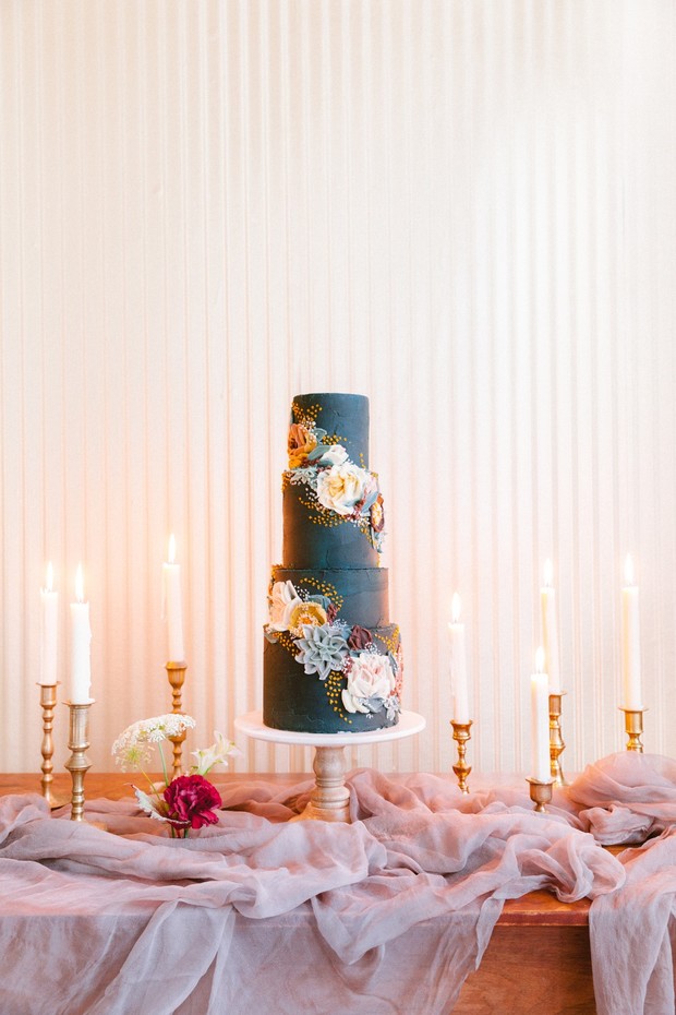 blue wedding cake with floral design