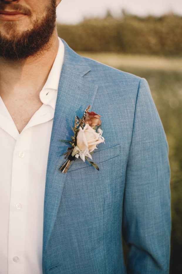 rose boutonniere for the groom