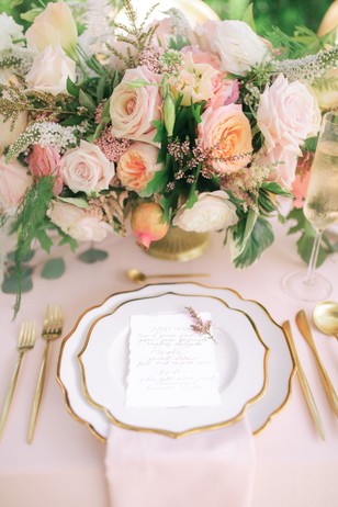 elegant pink and gold wedding table setting