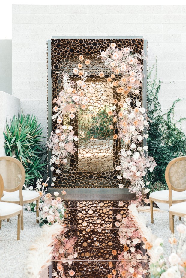 rose gold mirrored wedding aisle and floral decor