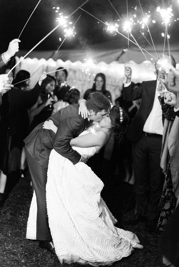 Wedding sparkler exit kiss