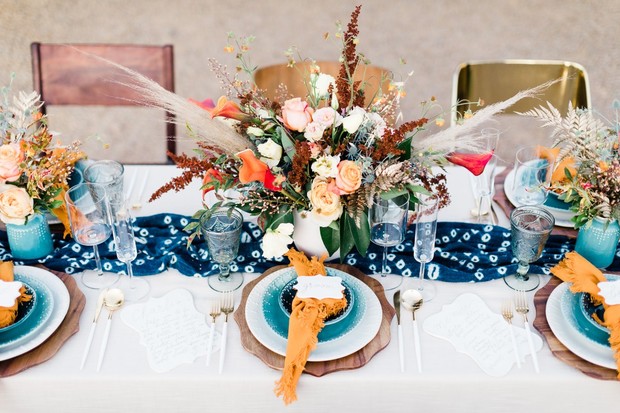 teal and gold wedding place settings