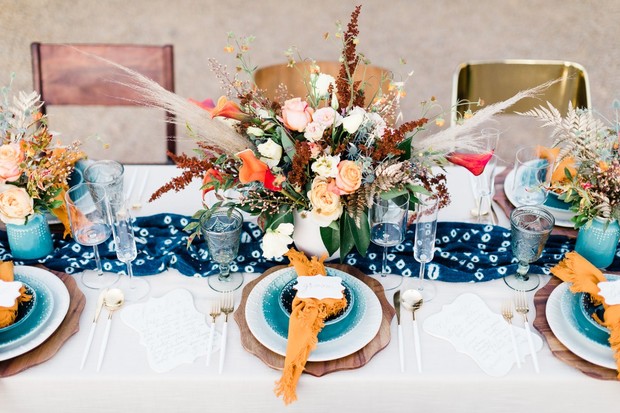Elegant wedding table decor with floral centerpiece