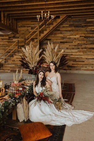 brides at their boho rustic themed table