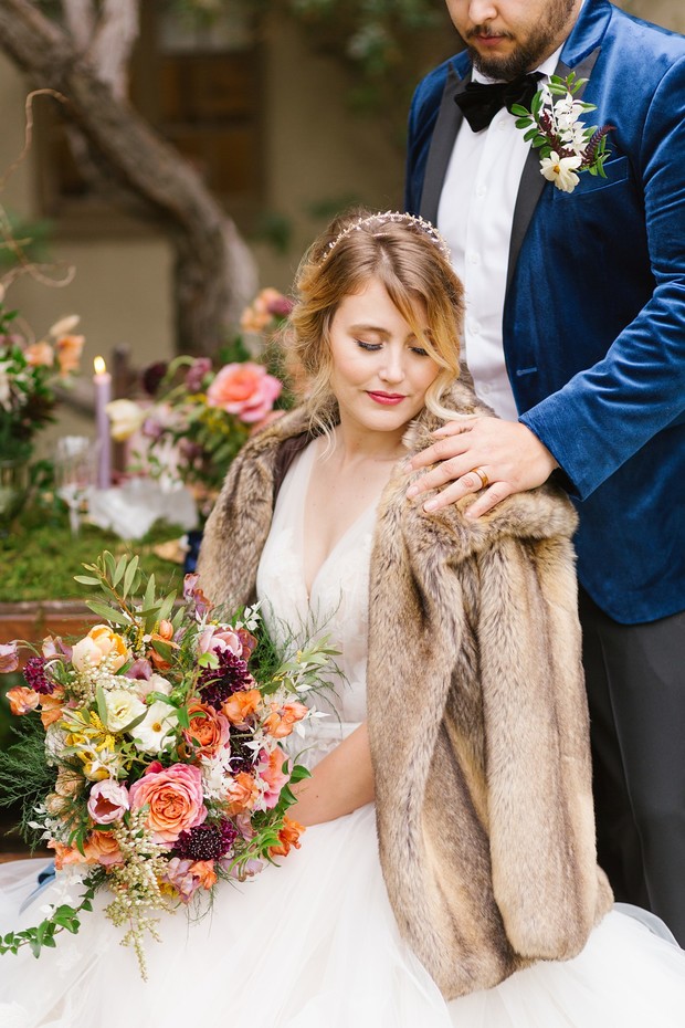 bride in faux fur jacket