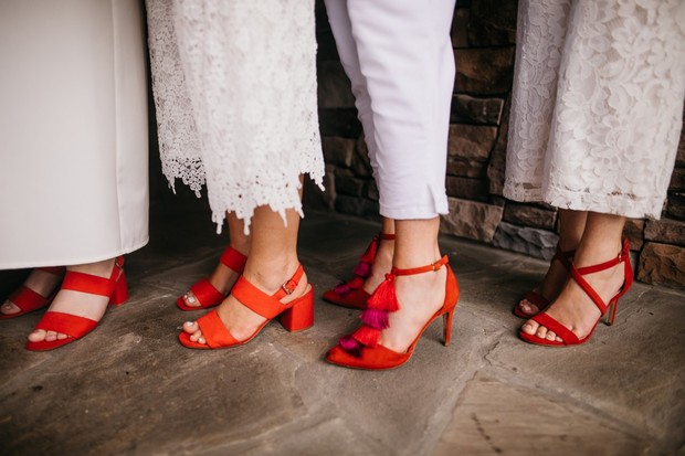 bridesmaids in red shoes