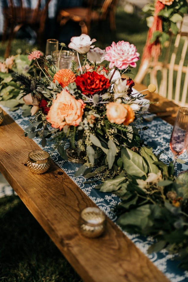 wedding florals and gold votives