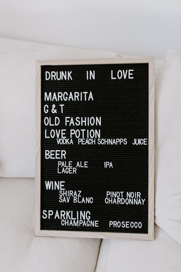 Drinks menu board with cocktails, beer, wine, and sparkling