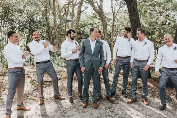 groom and groomsmen in grey and white