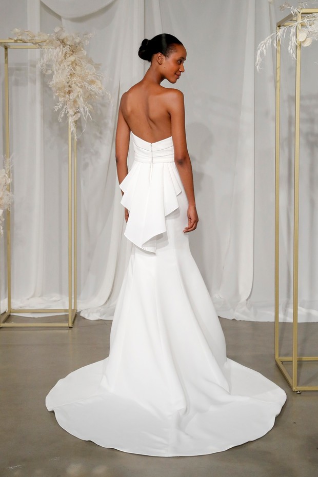 Strapless white wedding dress with cascading ruffle detail