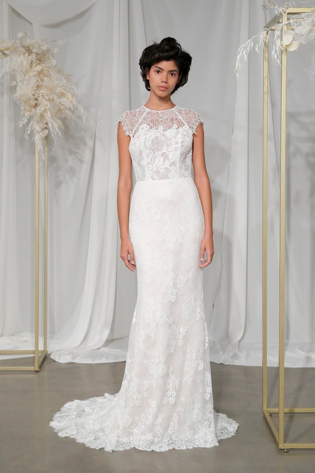Lace wedding gown with cap sleeves and fitted silhouette