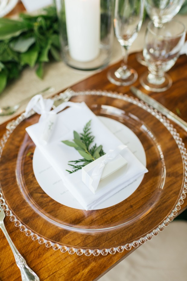 glass and white wedding place setting