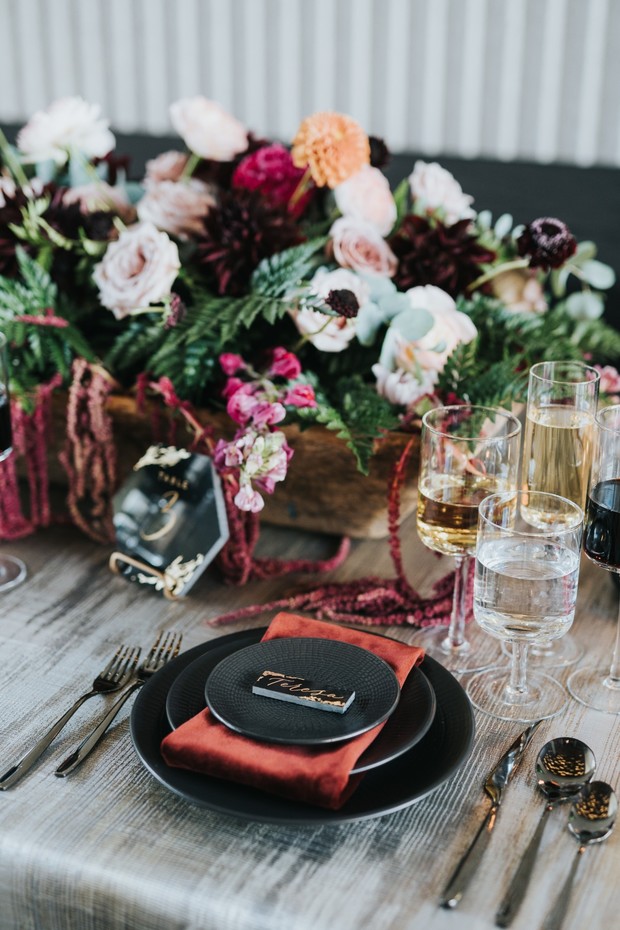 black and plush red wedding place setting