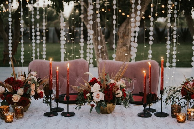 dusty pink burgundy and gold wedding sweetheart table
