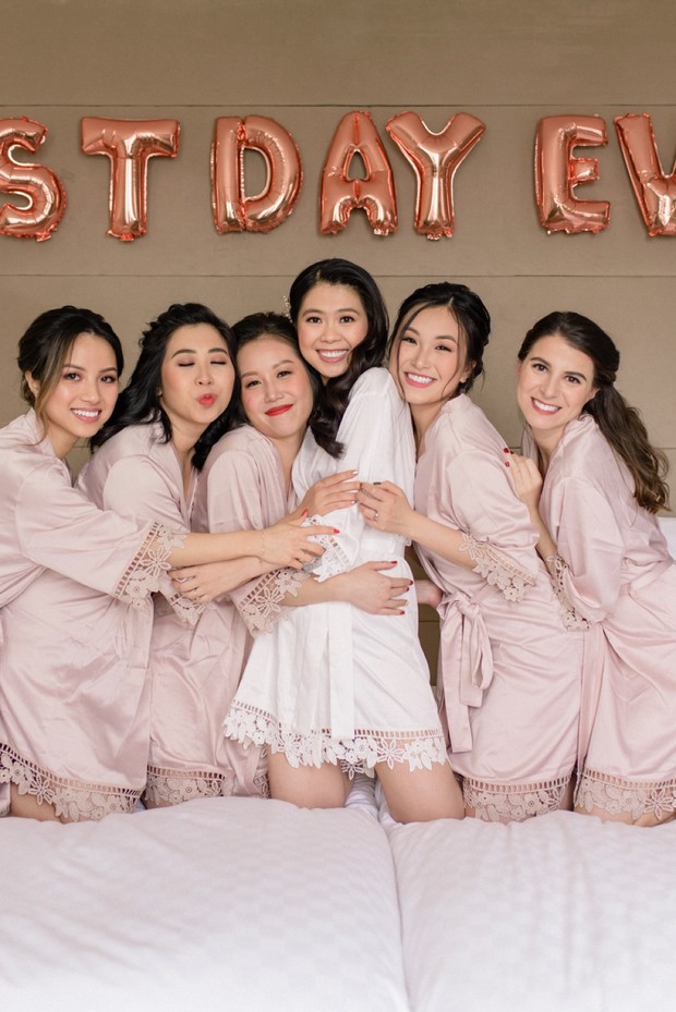 Bridesmaids celebrate the bride with Best Day Ever balloons