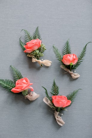 coral pink boutonnieres