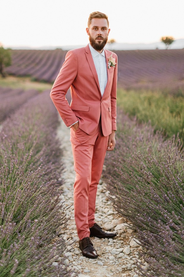 groom in pink suit