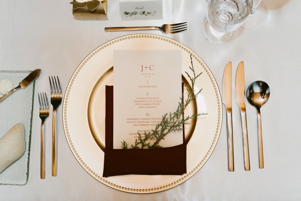 gold and burgundy wedding place setting