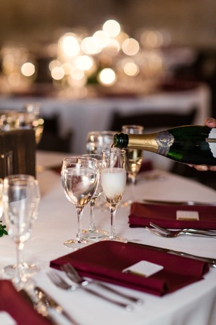 white and burgundy wedding table