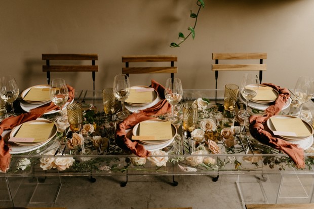 acrylic table top with floral decor wedding idea