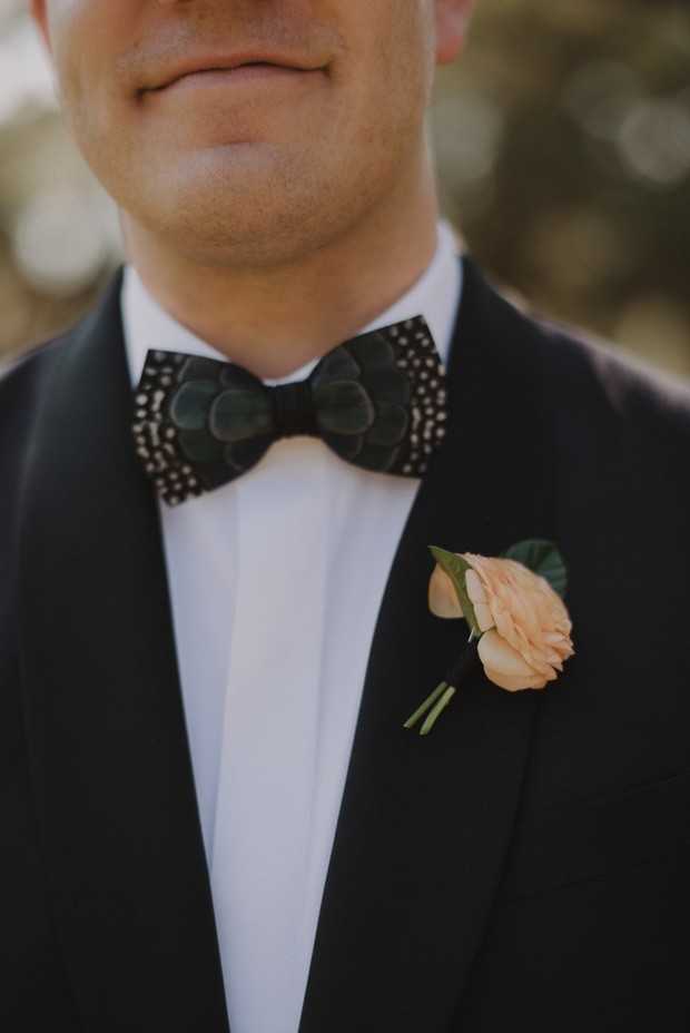 feather accented bow tie