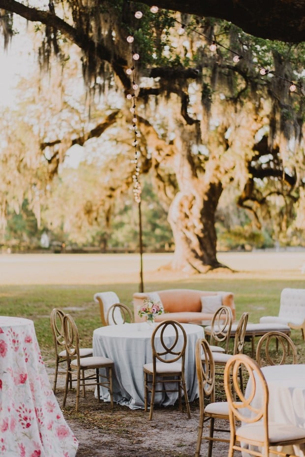 white and coral wedding reception outside