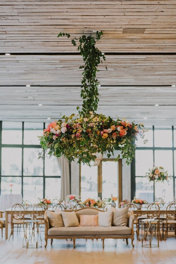 dramatic oversized floral chandelier over the dance floor