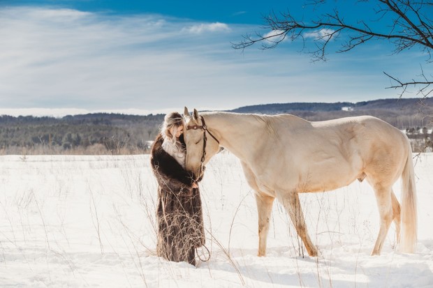 sweet bridal photo with white horse