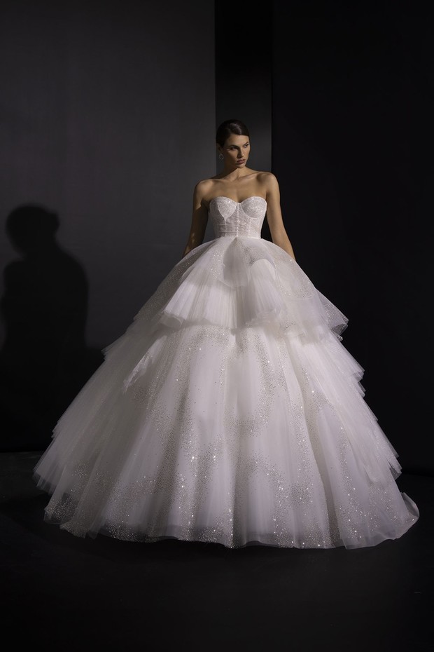 Elegant strapless wedding dress with sparkling layered tulle skirt