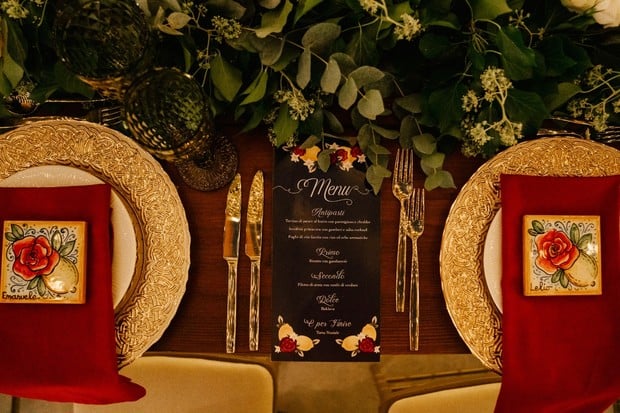gold and red wedding seating decor