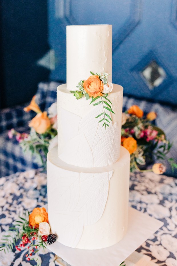 leaf patterned white wedding cake