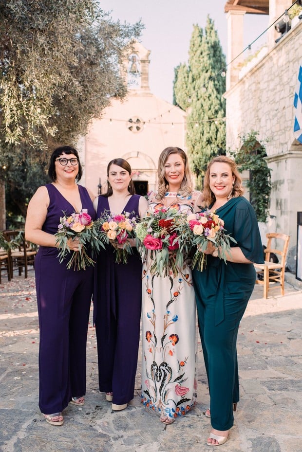 bride and her bridesmaids in jumpsuits