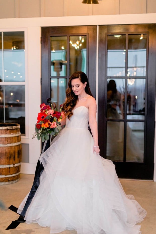 bride in elegant tulle tiered wedding dress