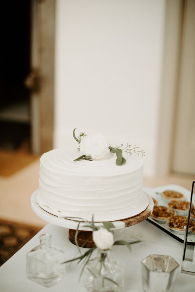 simple flower topped wedding cake